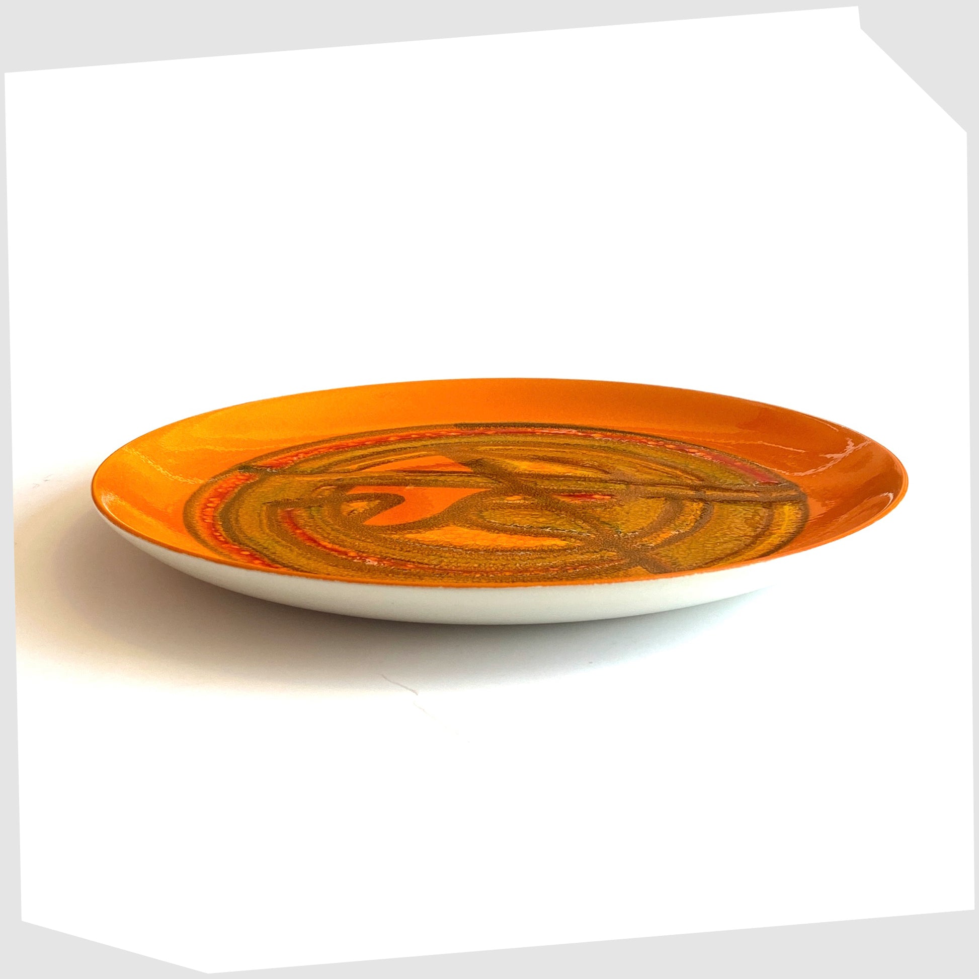 10" Poole Pottery Delphis Plate by Wendy Smith in a vibrant orange glaze with fluid forms of yellow and green