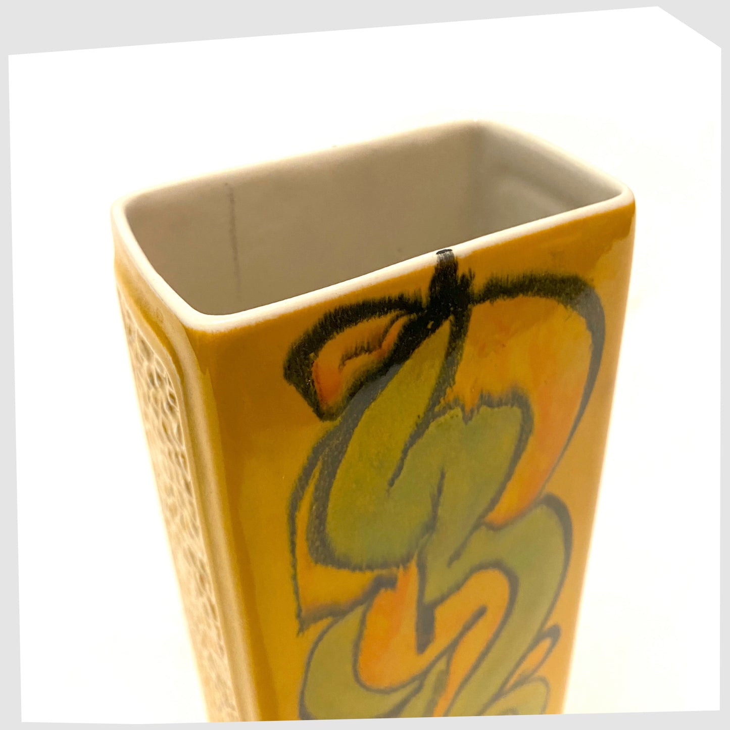 top rim f the poole pottery delphis vase in mustard yellow with green and orange glaze