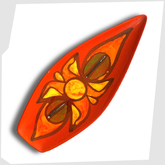 Poole Pottery Delphis Spear Dish, shape 82, finished in a vibrant red glaze with forms of orange, yellow and green