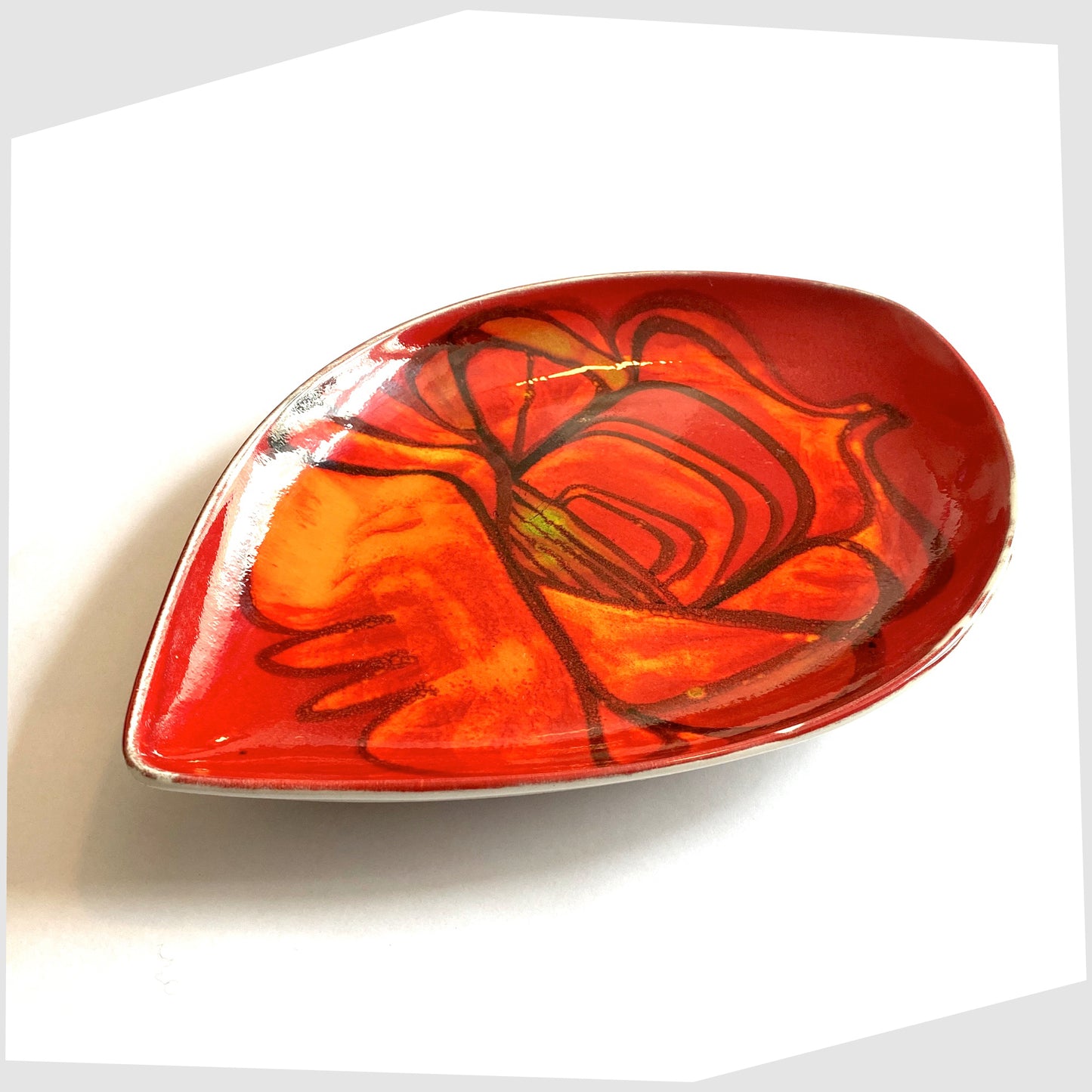vintage poole pottery delphis teardrop dish by Lynn Gregory, finished in a rich red with orange and green forms