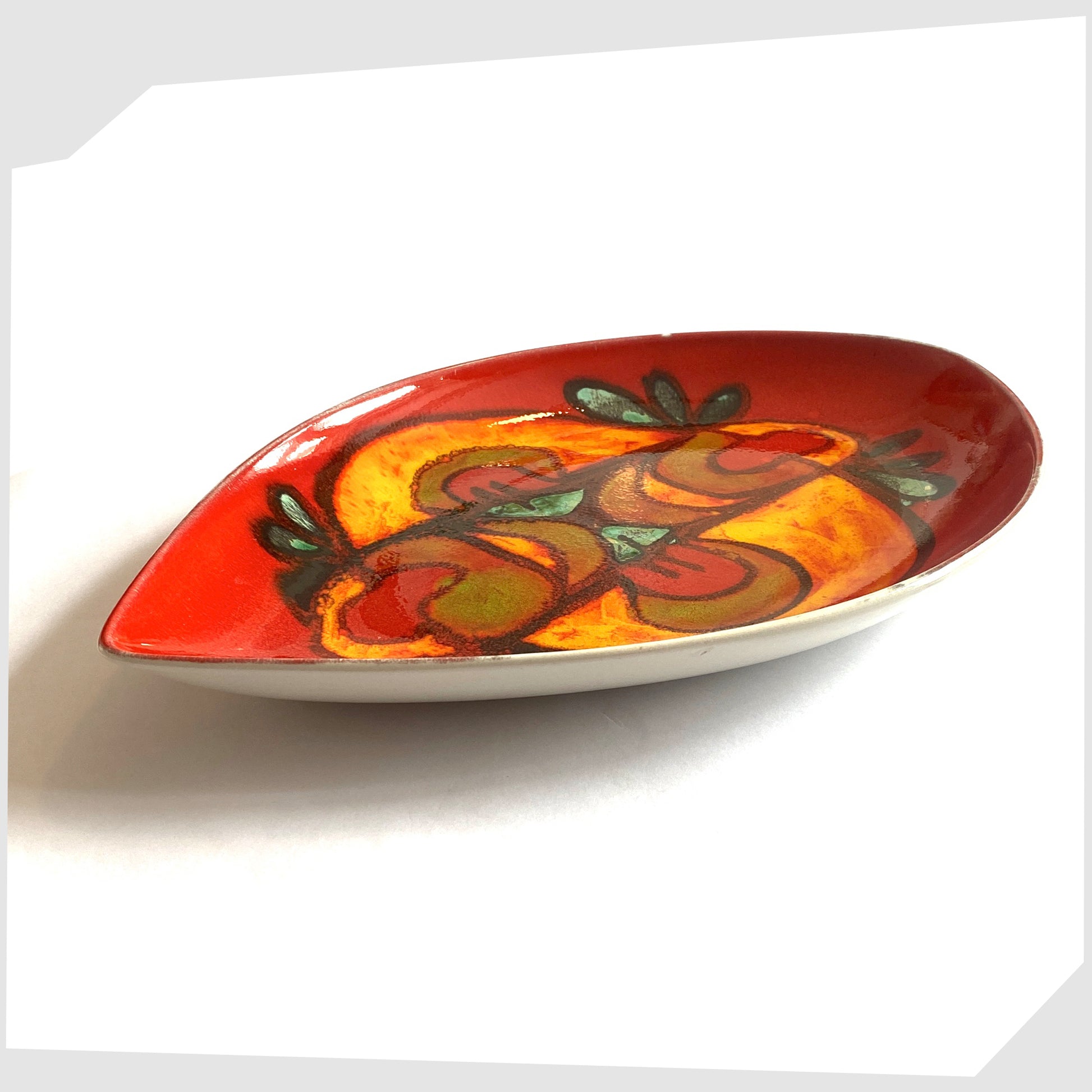 vintage poole pottery delphis teardrop dish by andree fontana, glazed in a rich red with fluid forms of orange and green