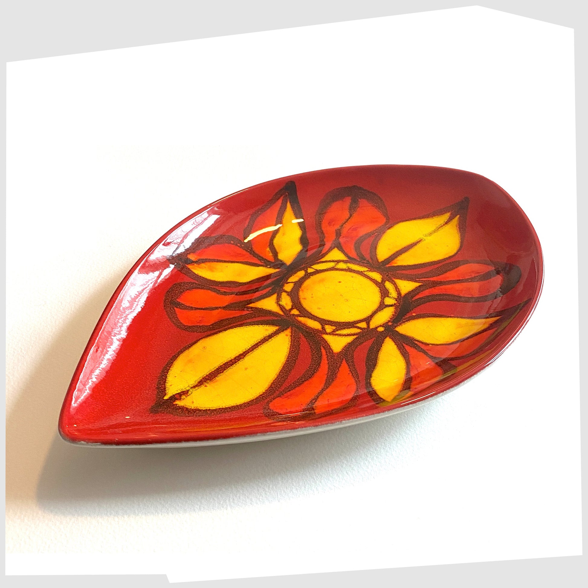 vintage Poole Pottery Delphis Teardrop dish in vivid red and yellow glaze, created by Janet Laird