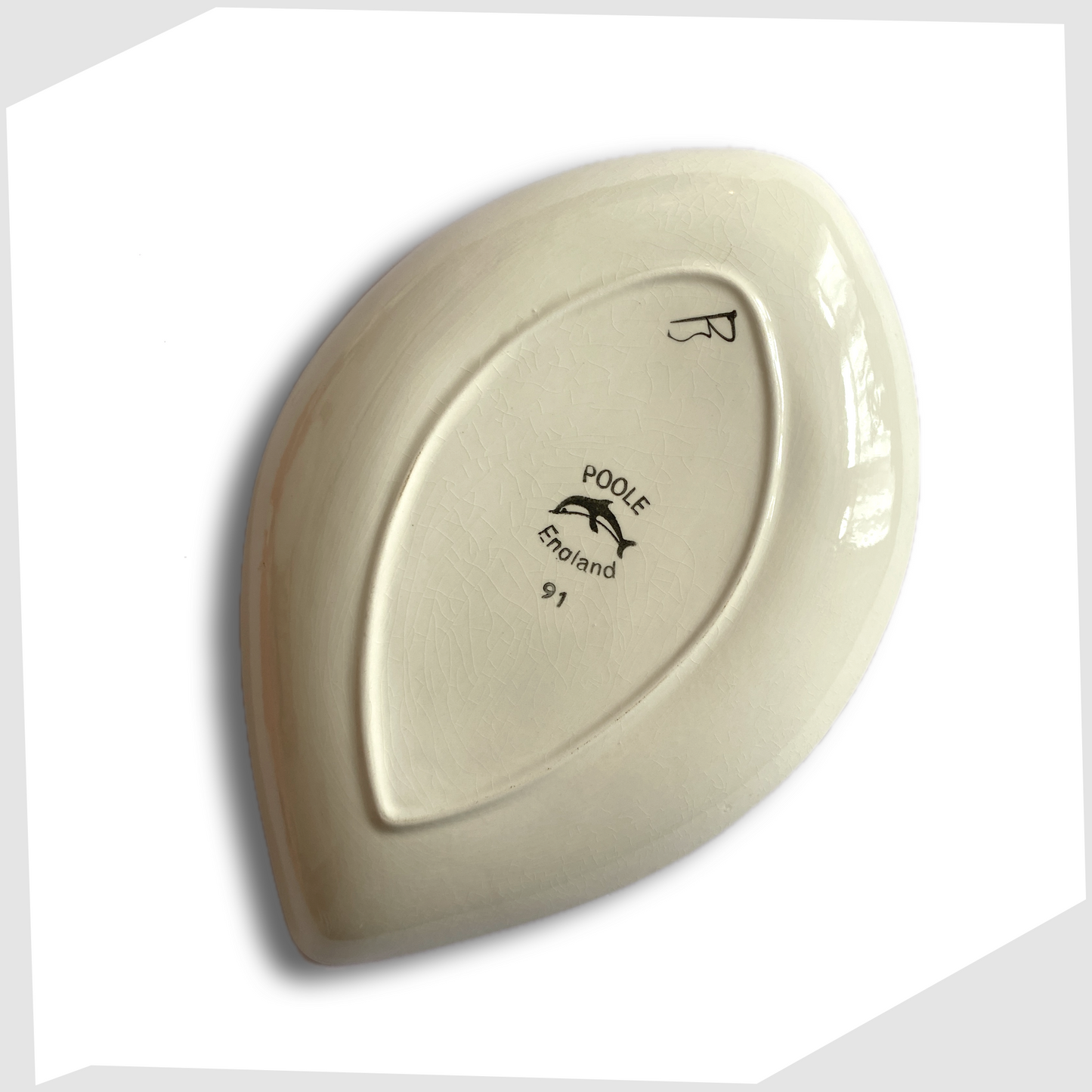 rear of the poole pottery teardrop shaped decorative dish