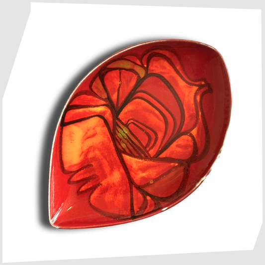 poole pottery delphis teardrop dish by Lynn Gregory, finished in a rich red with orange and green forms
