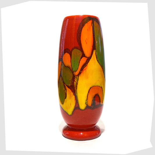 poole pottery delphis vase, shape 15, glazed in a vivid red with flowing forms of yellow, green and orange