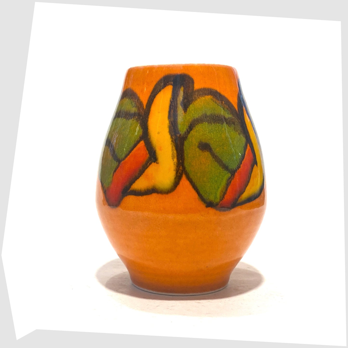 1970s Poole Pottery Shape 31 Vase by Cynthia Bennett finished in an Orange Delphis glaze with forms of green, yellow and red
