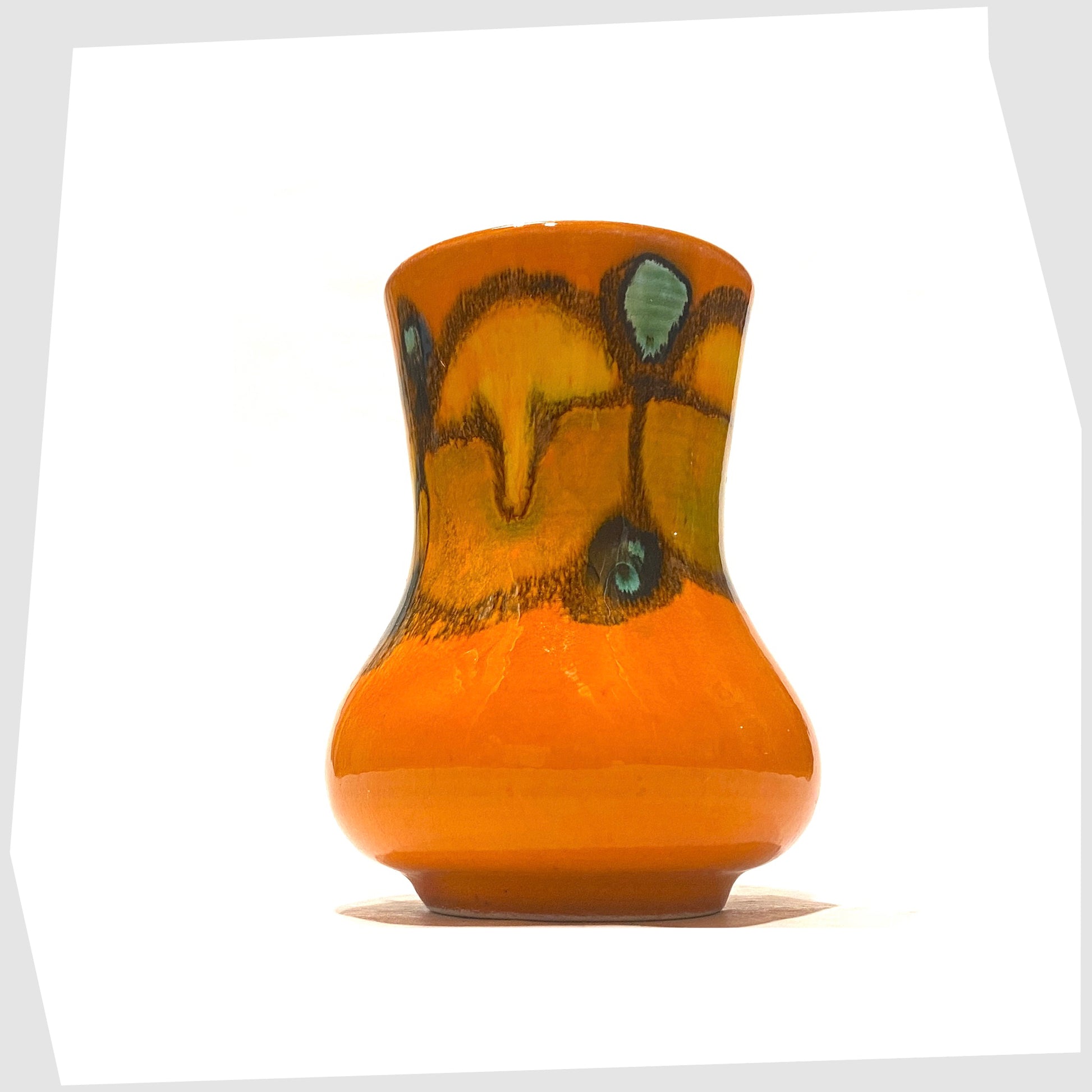 poole pottery delphis vase, shape 31, in a vivid orange glaze with green and yellow forms