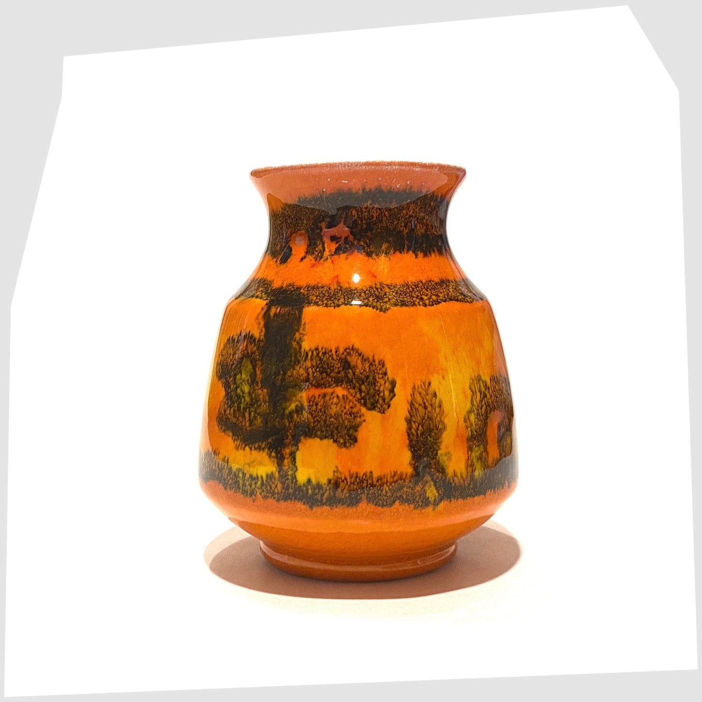 Poole Pottery Delphis Vase, shape 31, by Carol Cutler in a vibrant orange glaze with geometric forms of yellow and green