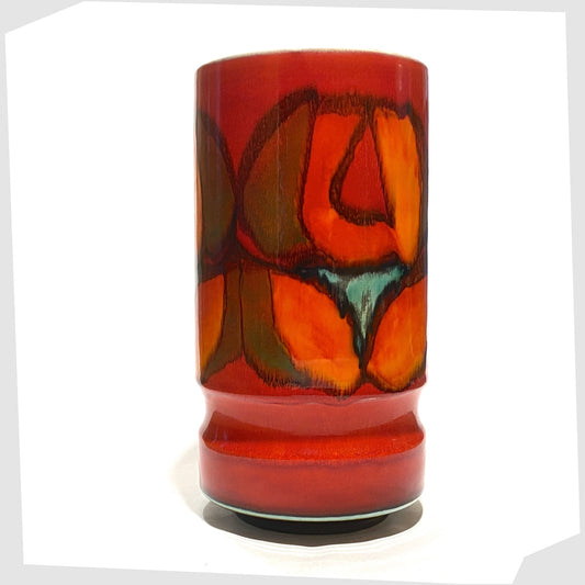 Poole Pottery cylinder vase, shape 84, in a red, green and orange Delphis glaze by Cynthia Bennett