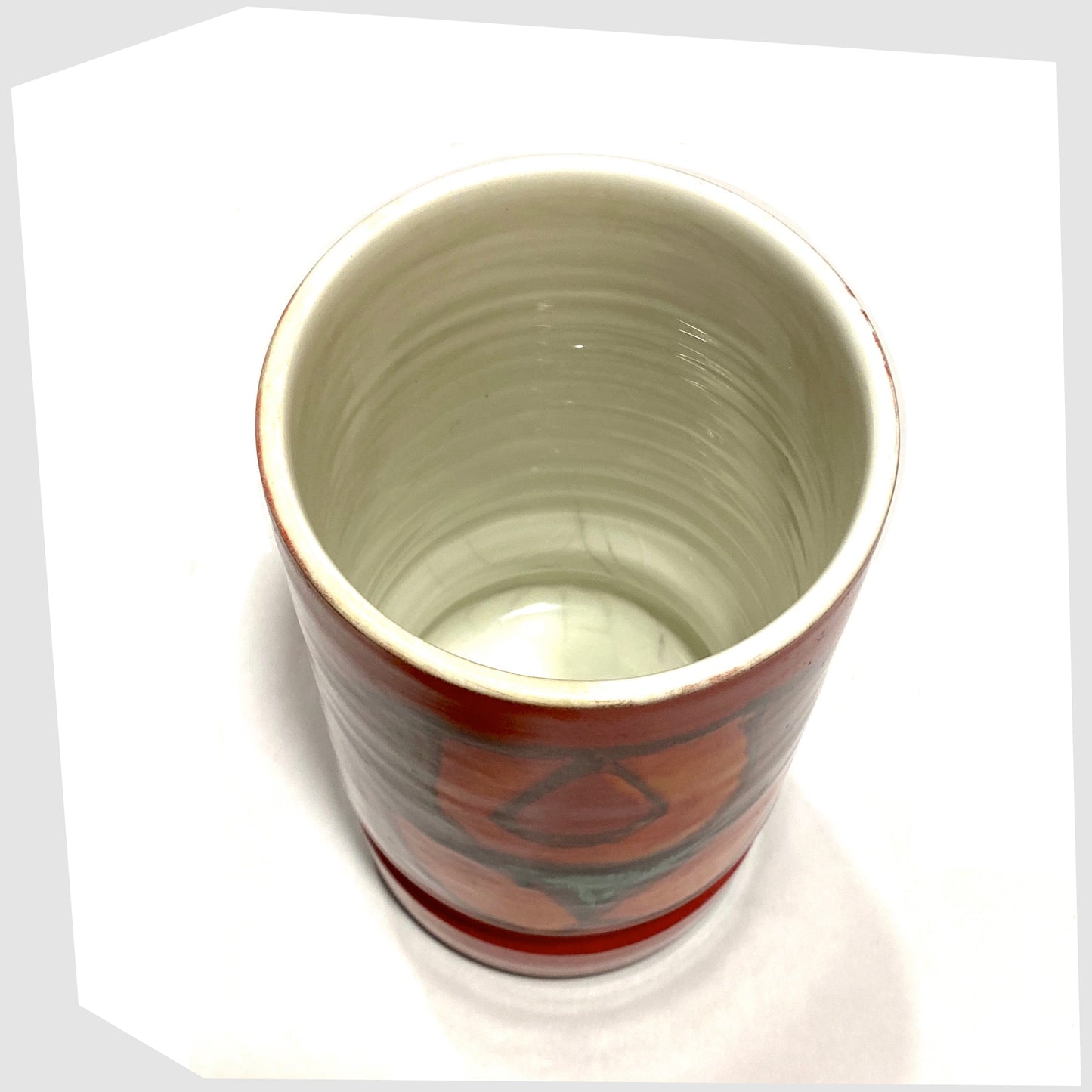 inner white glaze of the Poole Pottery cylinder vase, shape 84, by Cynthia Bennett