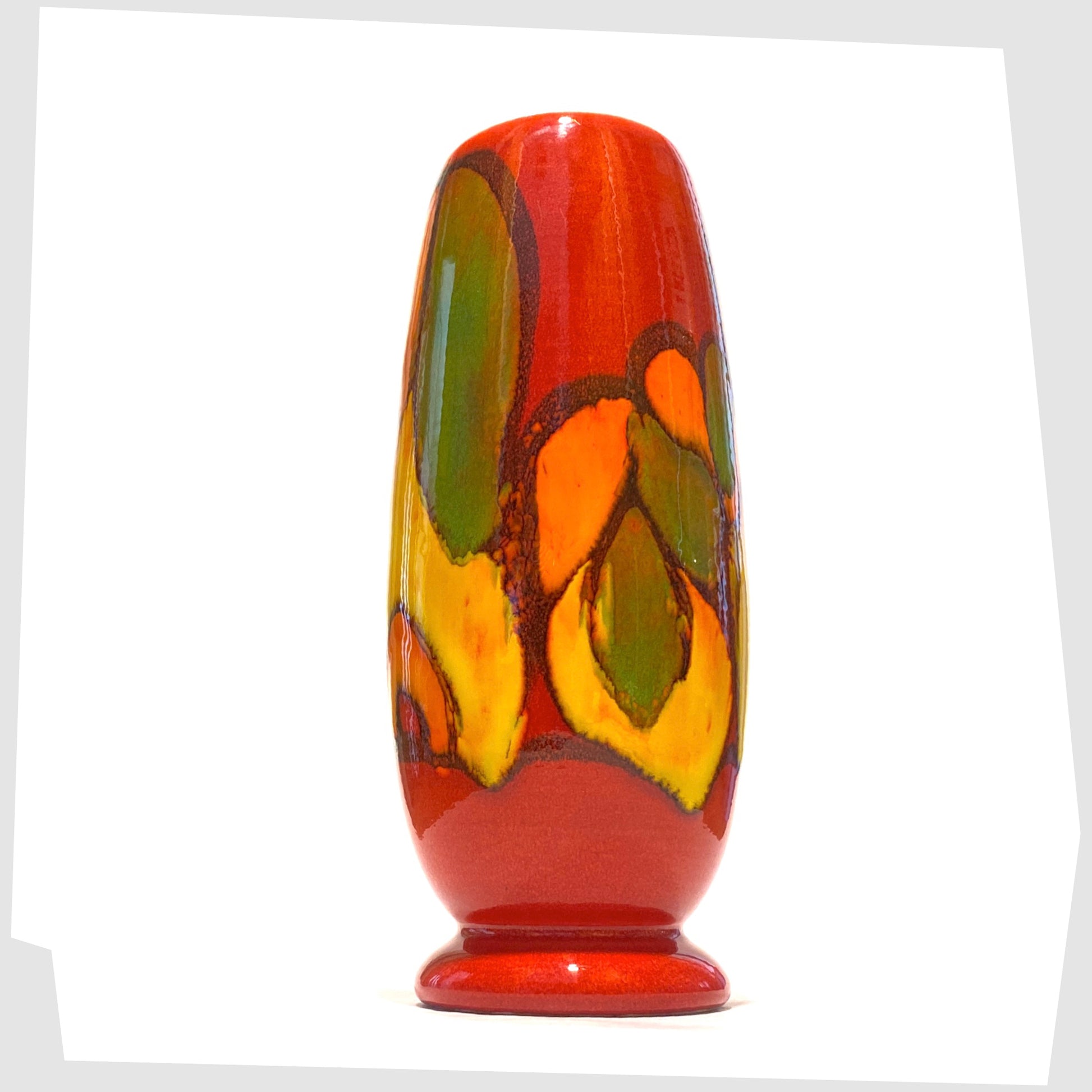 1960s poole pottery delphis vase, shape 15, glazed in a vivid red with flowing forms of yellow, green and orange