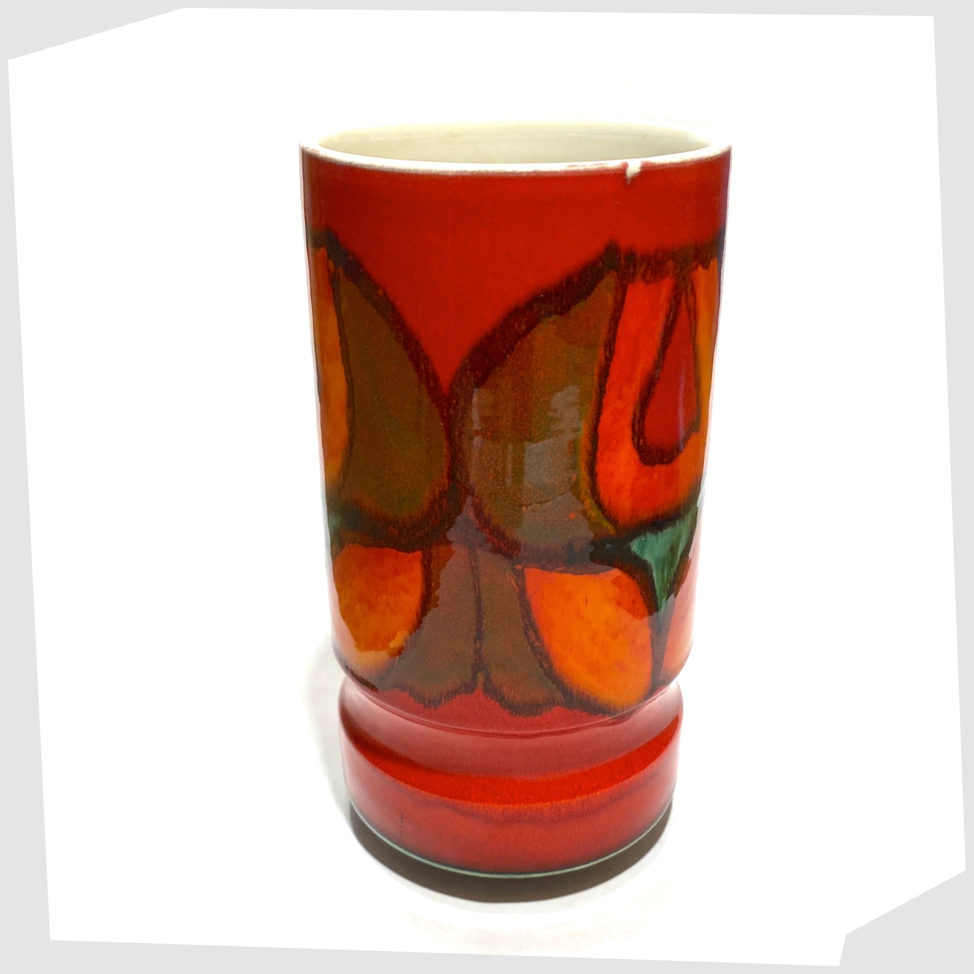top rim of the Poole Pottery cylinder vase, shape 84, in a red, green and orange Delphis glaze by Cynthia Bennett