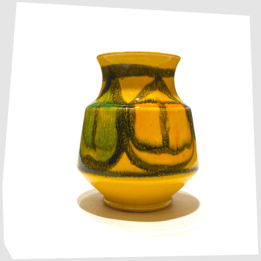 vintage Poole Pottery Delphis Vase, shape 31, by Janet Laird, glazed in a vibrant yellow with a flowing pattern of green and orange