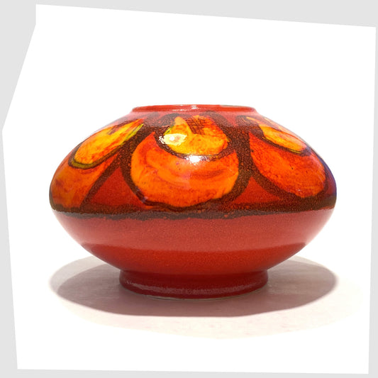 Poole Pottery Delphis Vase, Shape 32, by Anita Lawrence in a vivd red with fluid forms of orange and yellow glaze