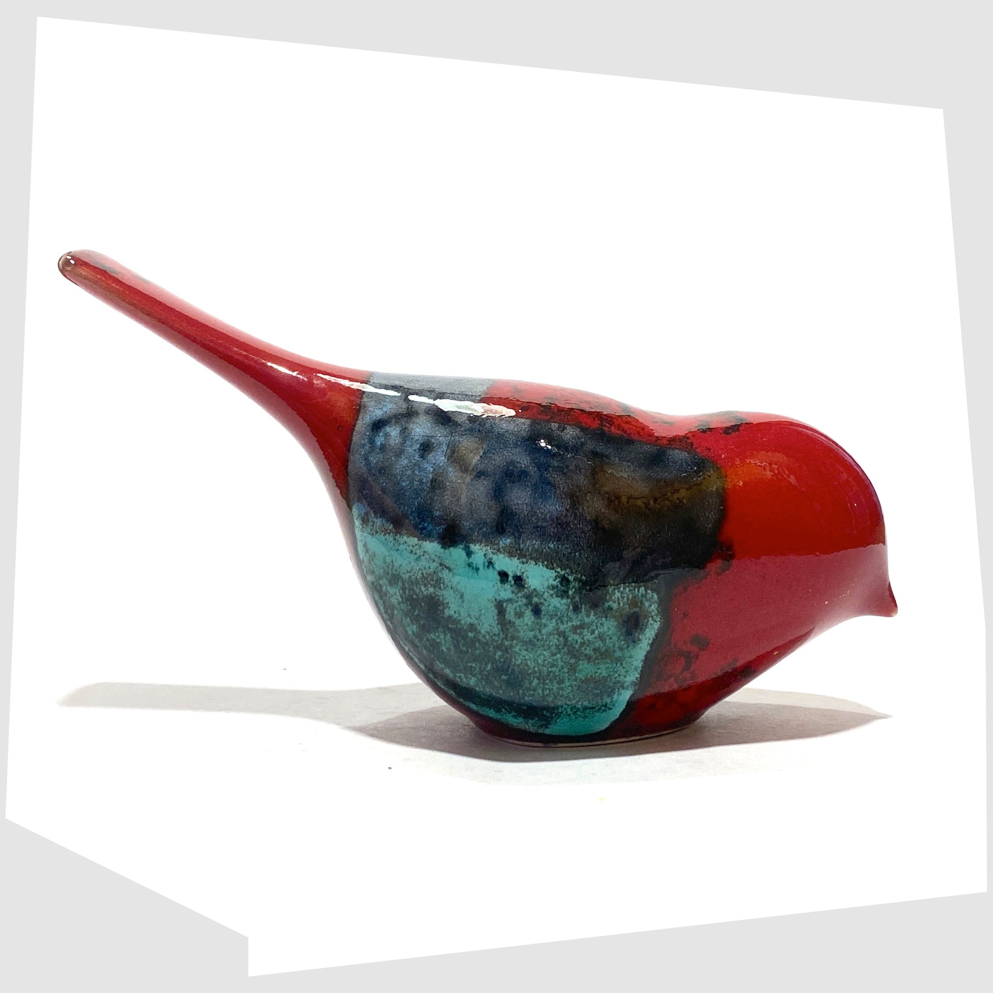 Poole Pottery Pecking Bird in Gemstone glaze of rich red with artistic squares of green, blue, orange and warm grey