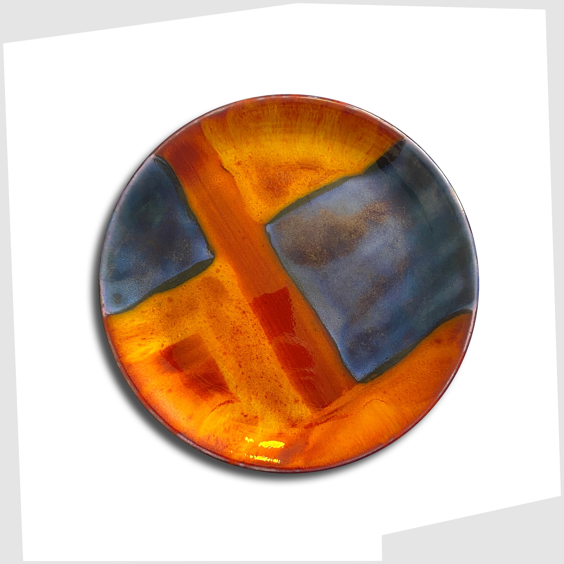 poole pottery plate in gemstones glaze of rich orange, red and blue squares