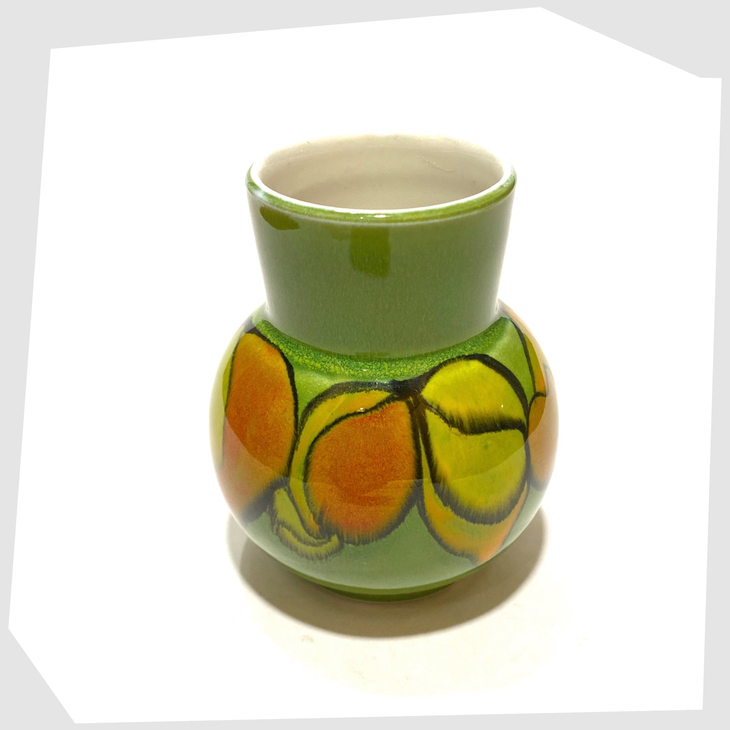 top rim of the vintage poole pottery vase, shape 31 by Julia Wills, finished in a green delphis glaze with yellow and orange forms