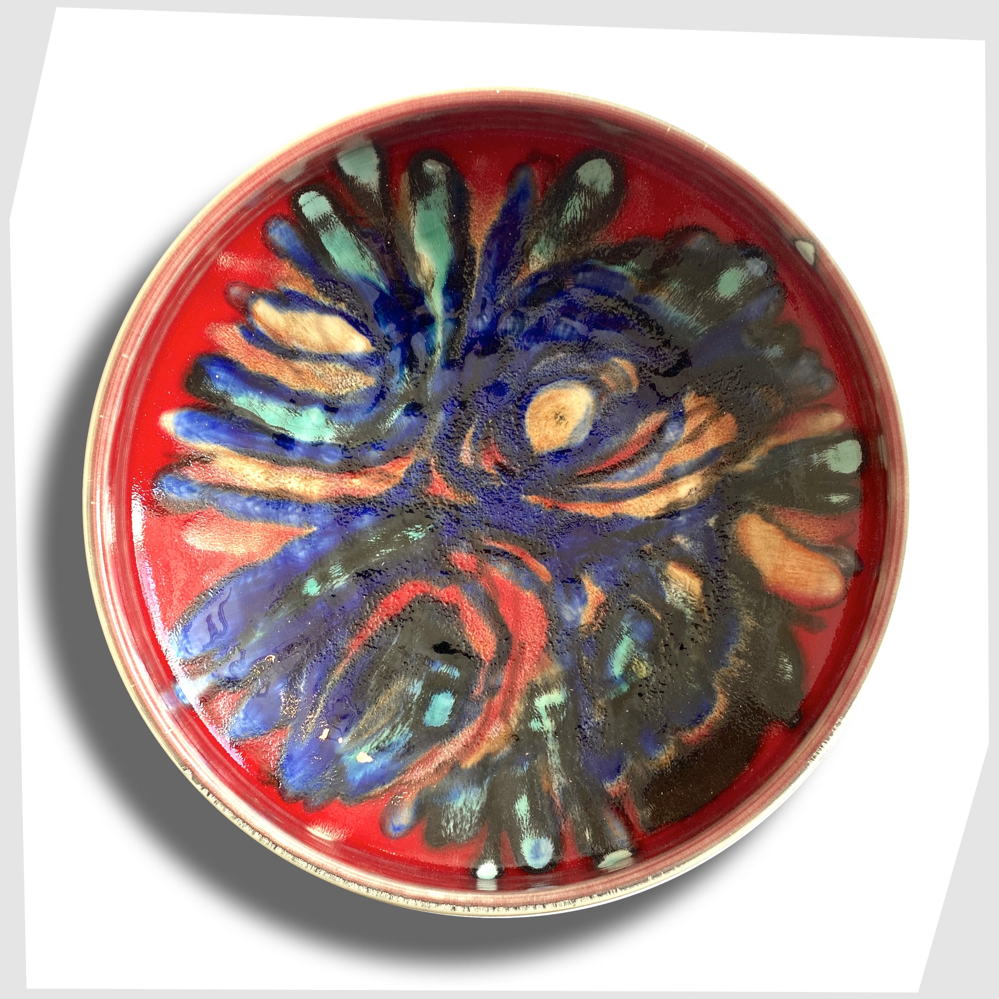 large Poole Pottery 11" Bowl in an artistic Delphis glaze of red, cobalt blue and turquoise