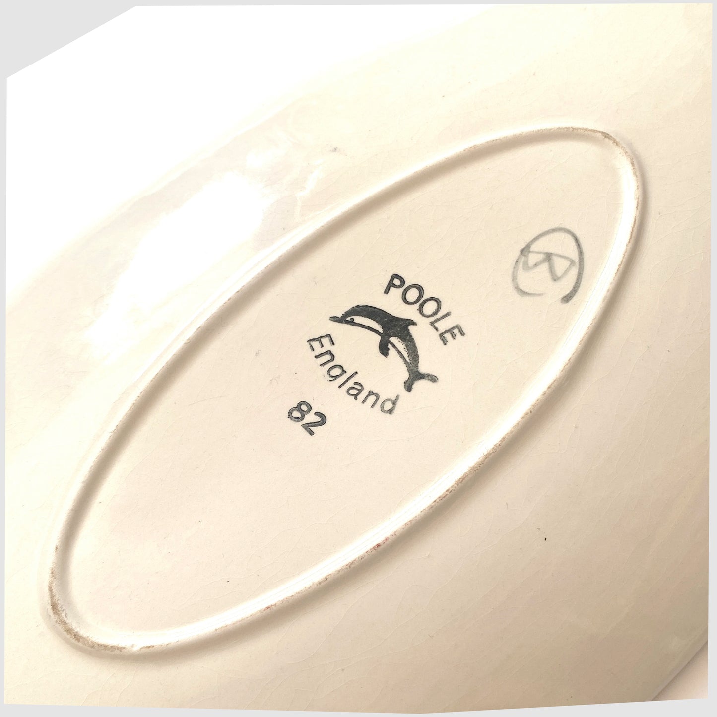 rear-poole-pottery-stamp-and-model-82-mark-on-the-delphis-dpear-dish