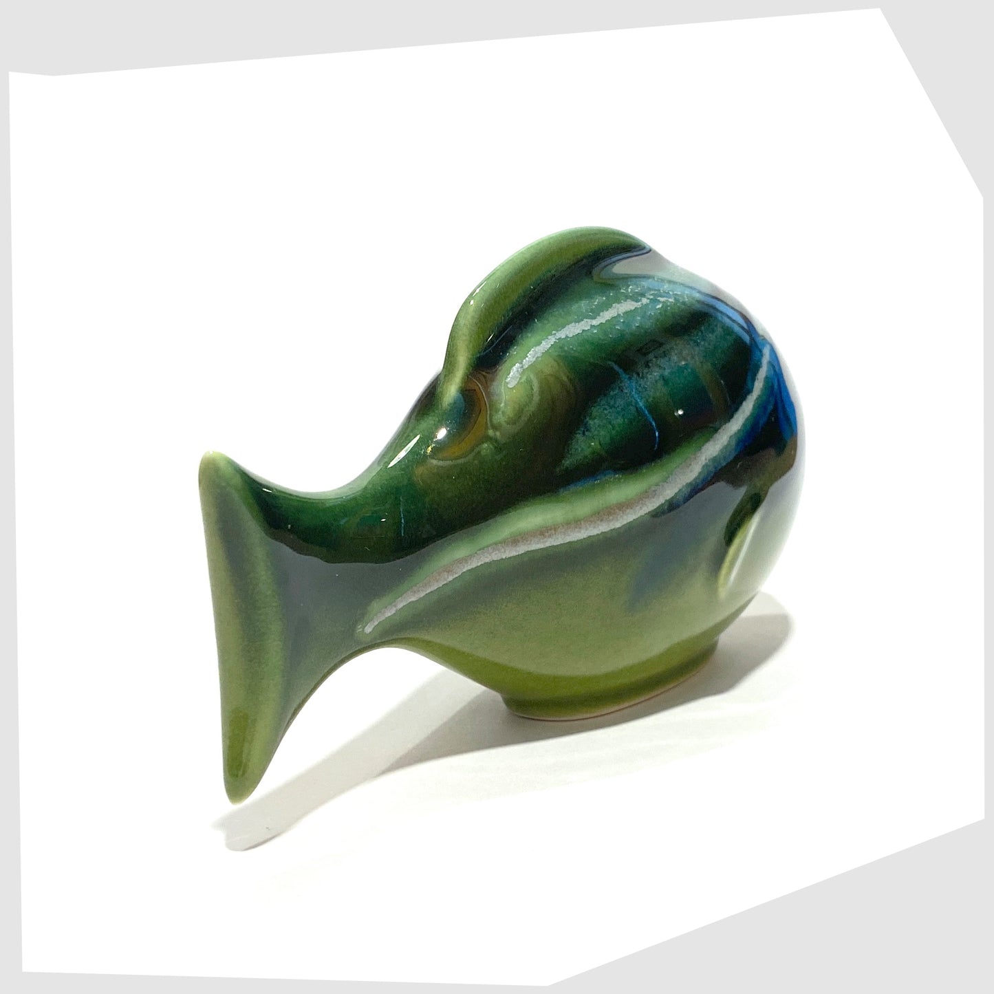 rear of the poole pottery large fish ornament in maya glaze of green, blue and warm grey