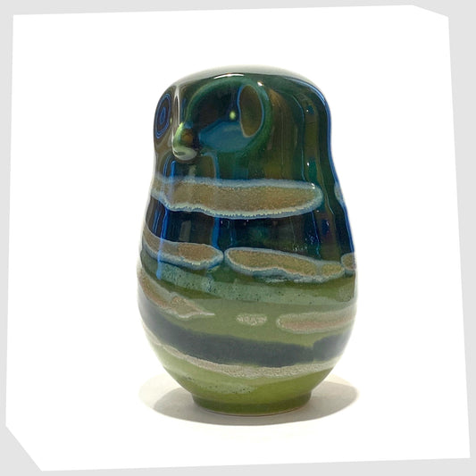 poole pottery large owl ornament glazed in the Maya finish of green, blue and warm grey