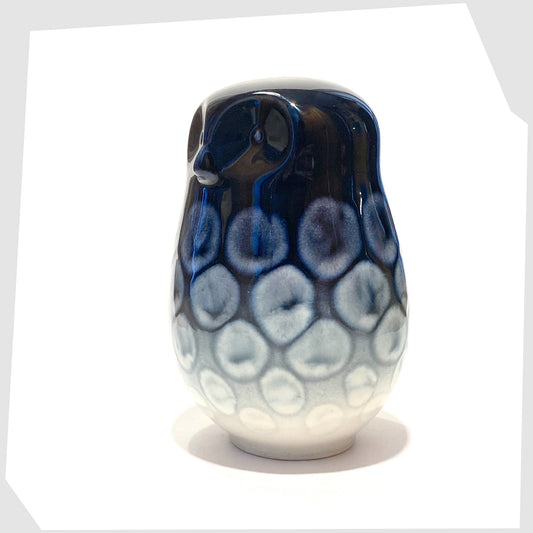 poole pottery owl in ocean glaze of navy blue with white circular forms