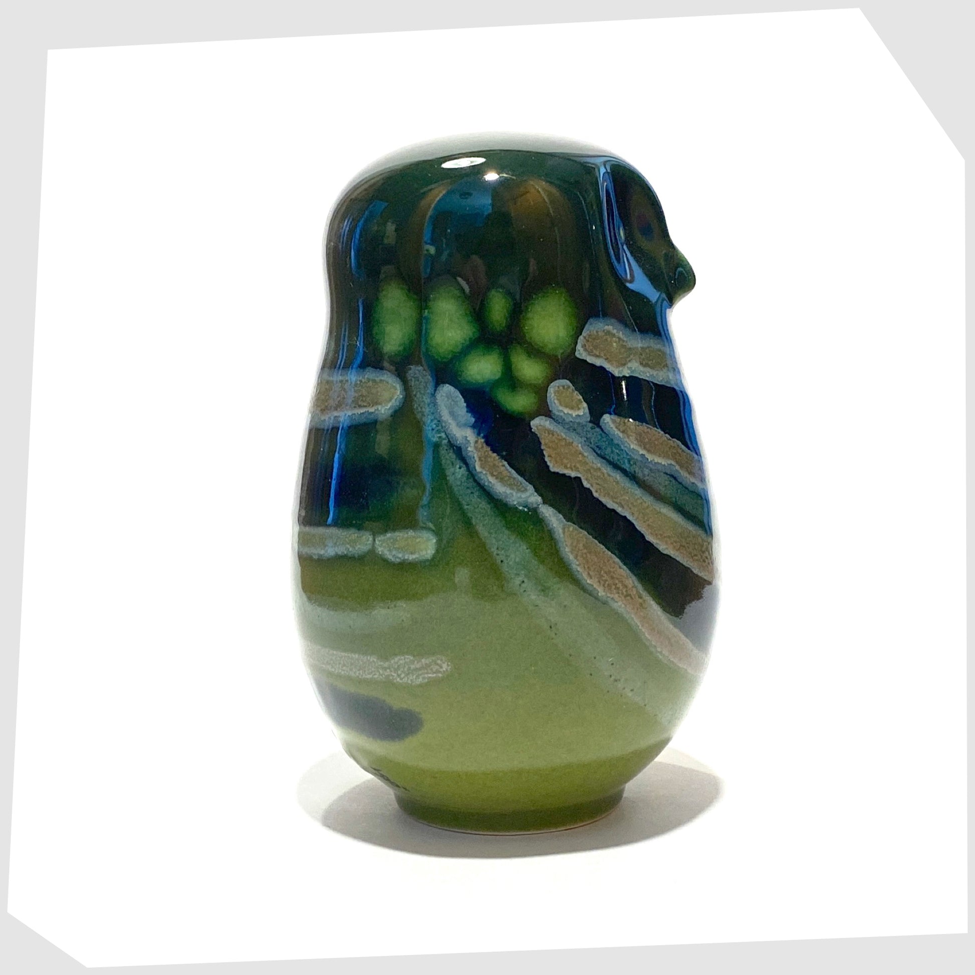 poole pottery owl ornament in the Maya glaze of green, blue and warm grey