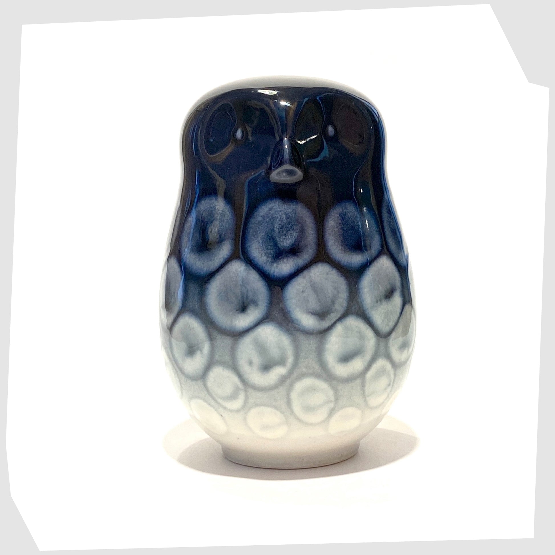 large poole pottery ceramic owl in ocean glaze of navy blue with white circular forms