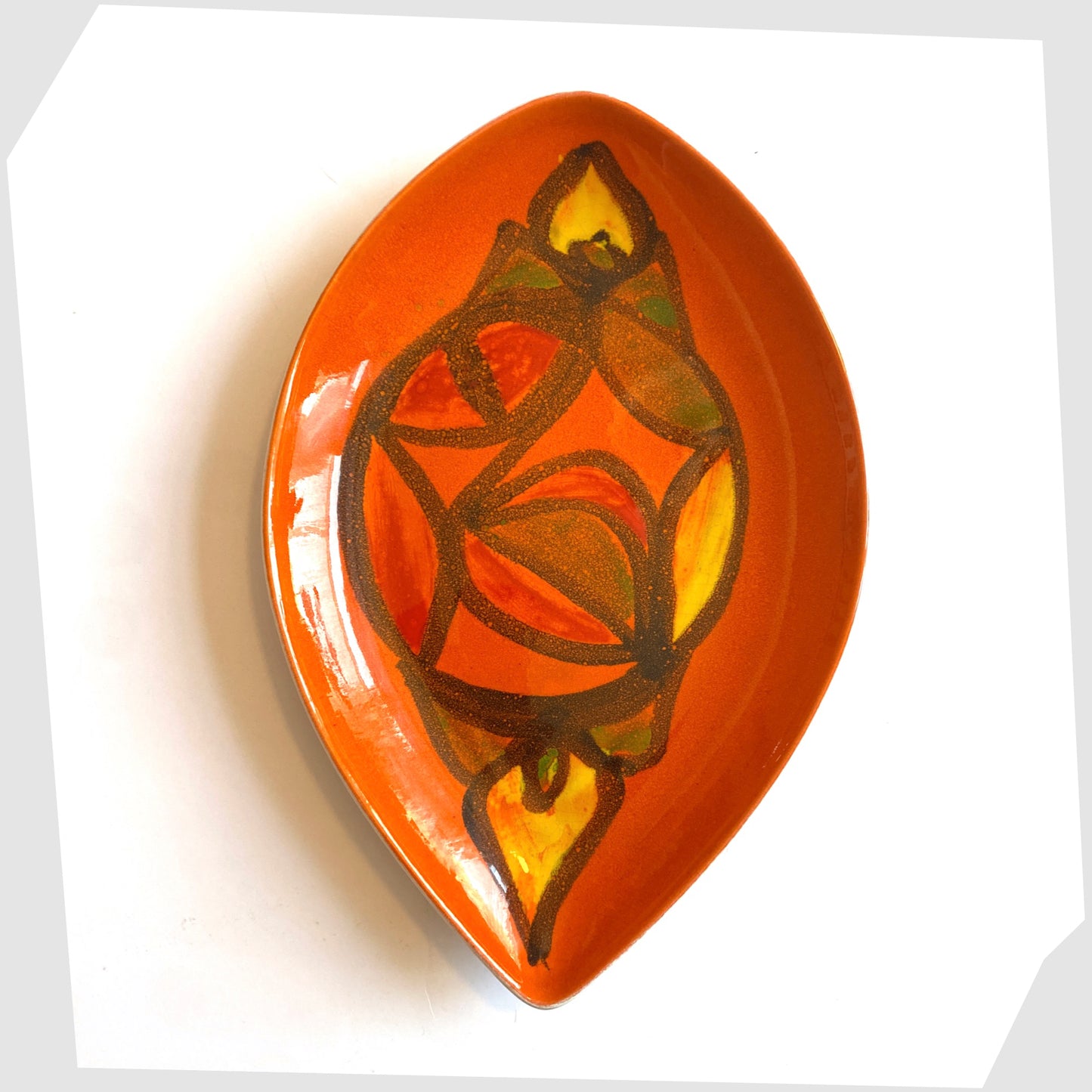 Vintage Poole Pottery Delphis Teardrop Dish by Anita Lawrence in an orange glaze with fluid forms of red, yellow and green
