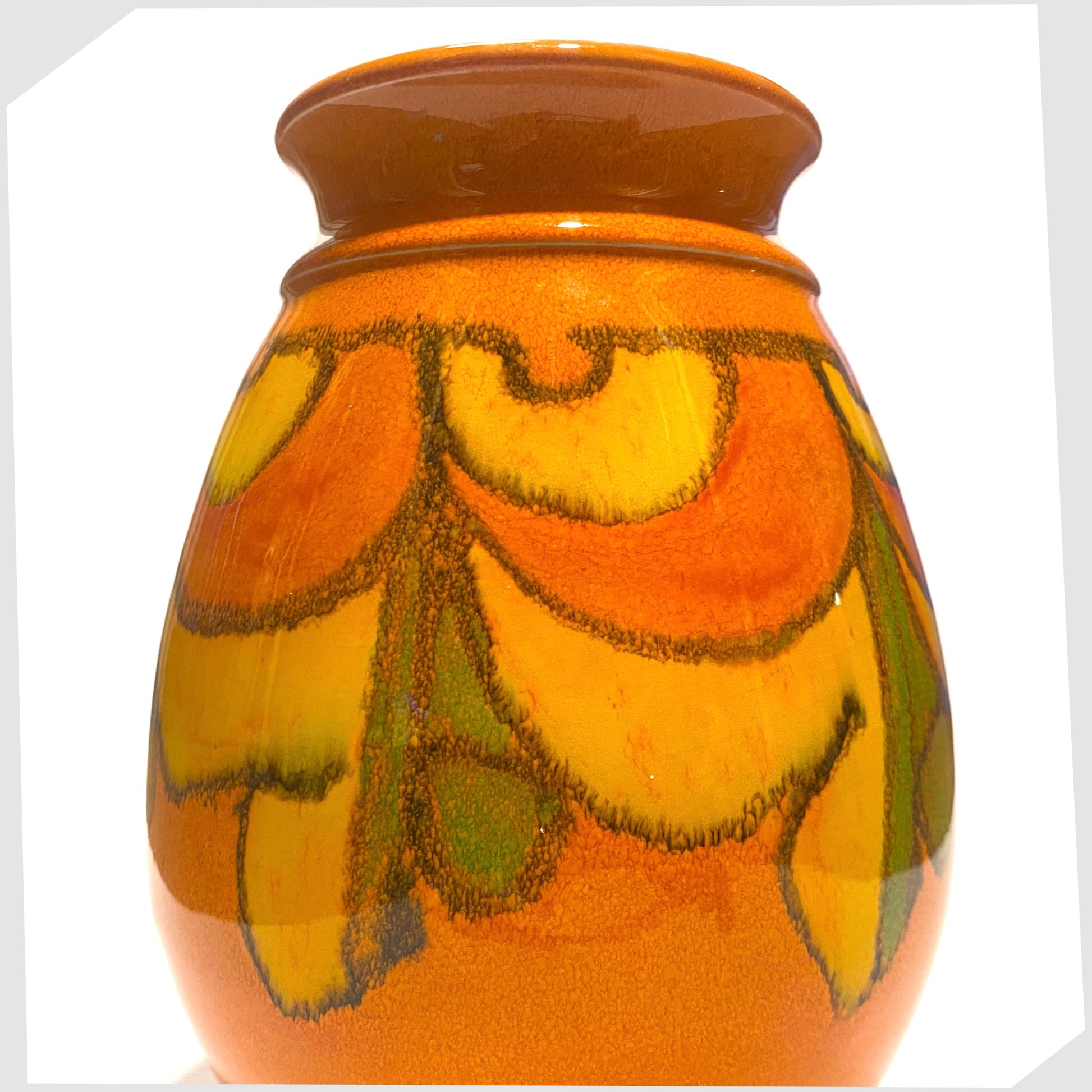 close up of the Poole Pottery Delphis Vase by Cynthia Bennett finished in a vivid orange glaze with flowing free-forms of yellow and green