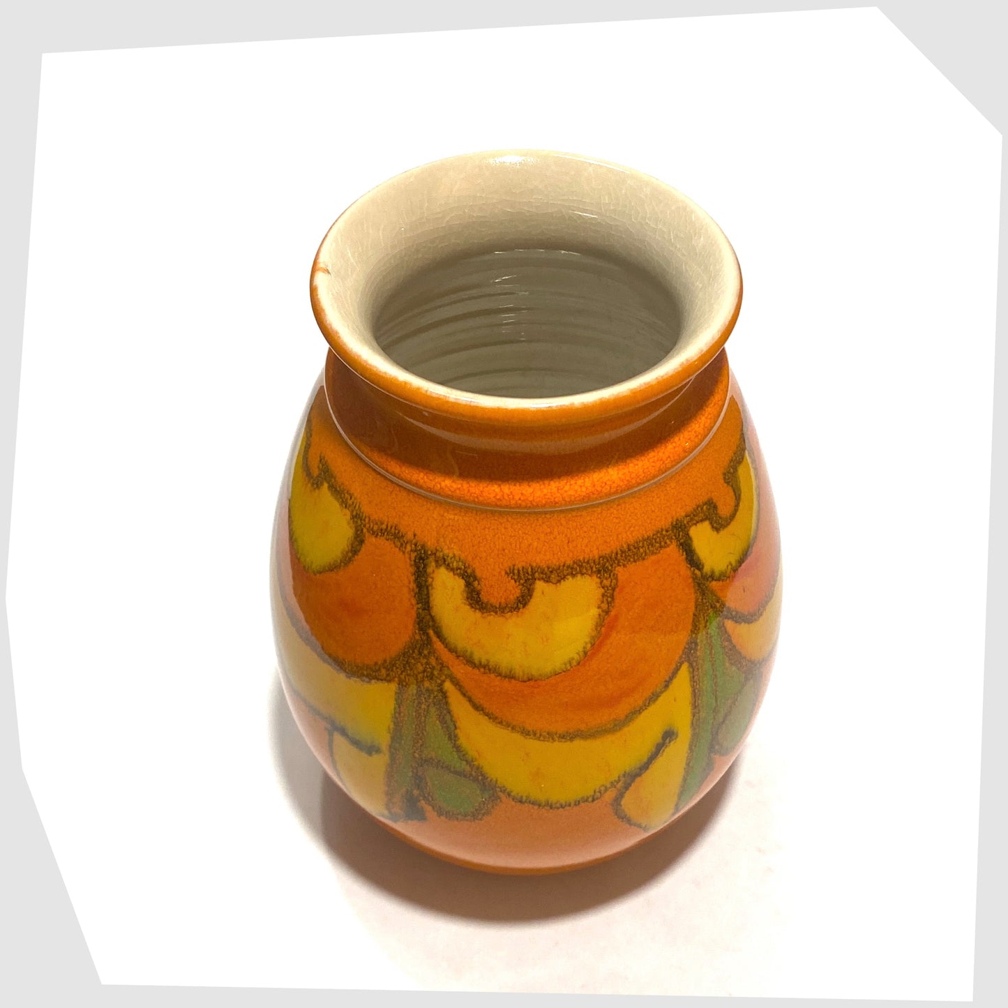 top rim and inner white glazing of the Poole Pottery Delphis Vase by Cynthia Bennett finished in a vivid orange glaze with flowing free-forms of yellow and green