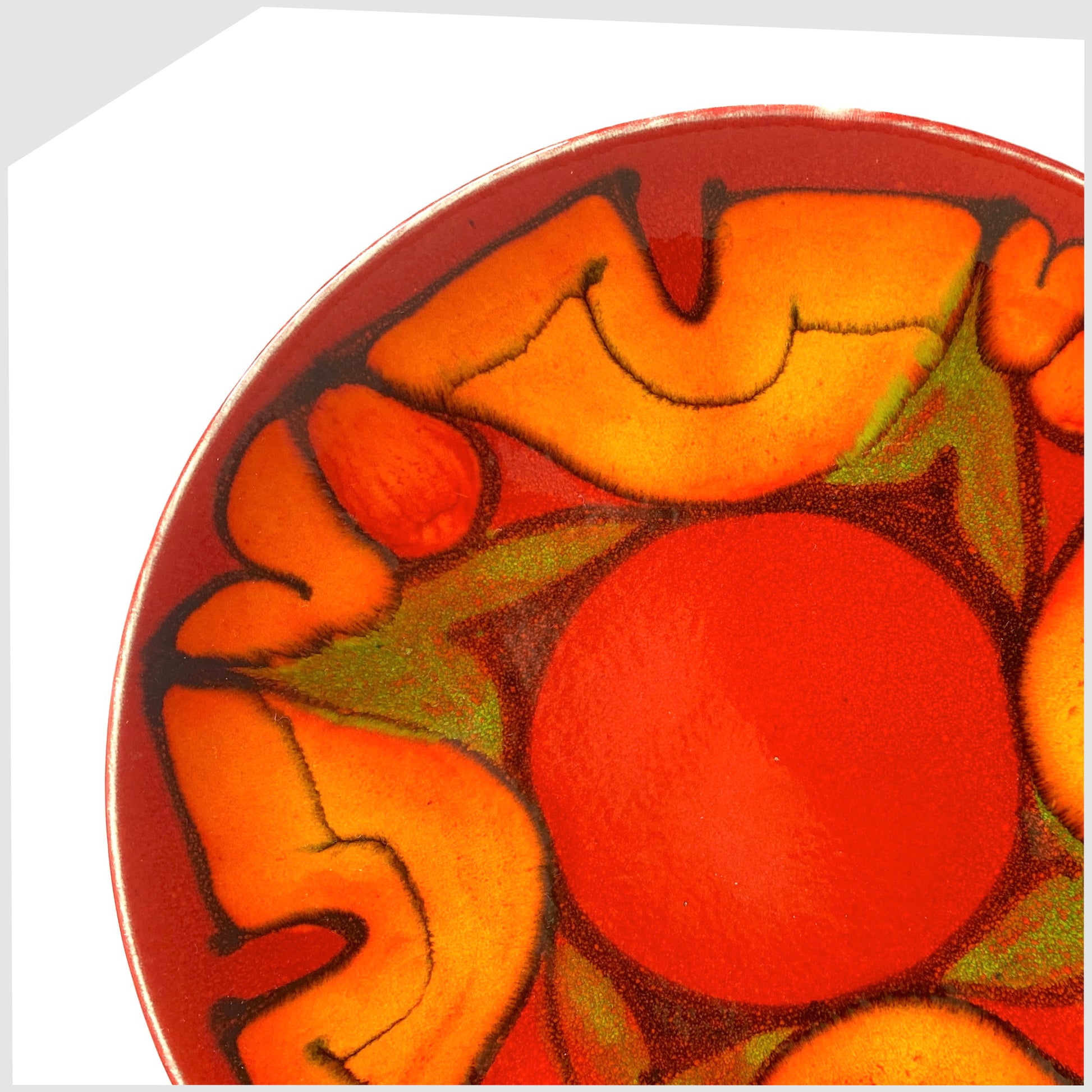 Poole Pottery in the Delphis glaze of red with orange and green forms