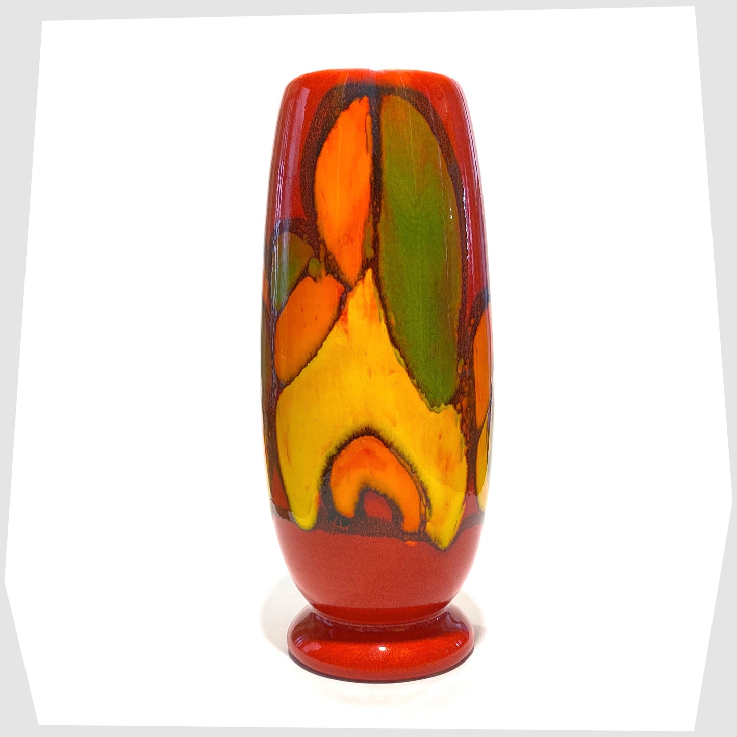 vintage poole pottery delphis vase, shape 15, glazed in a vivid red with flowing forms of yellow, green and orange
