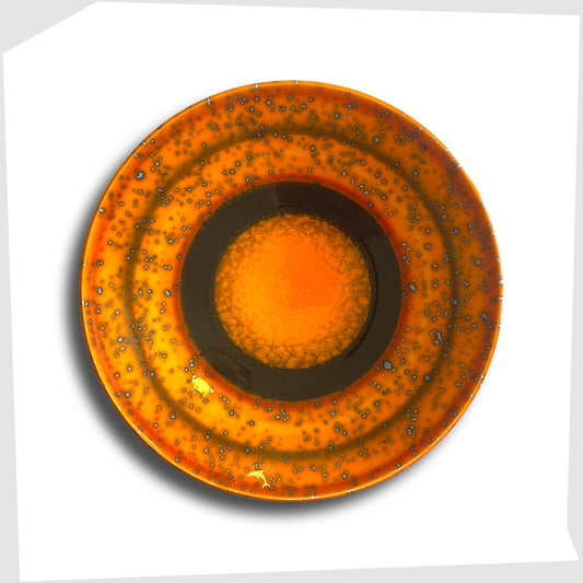 poole pottery decorative Saturn plate designed by Alan Clarke to mark the alignment of the planets in 2000.