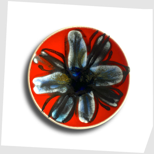 Poole Pottery Delphis Pin Dish, shape 49, finished in a rich red glaze with abstract forms of blue and warm grey