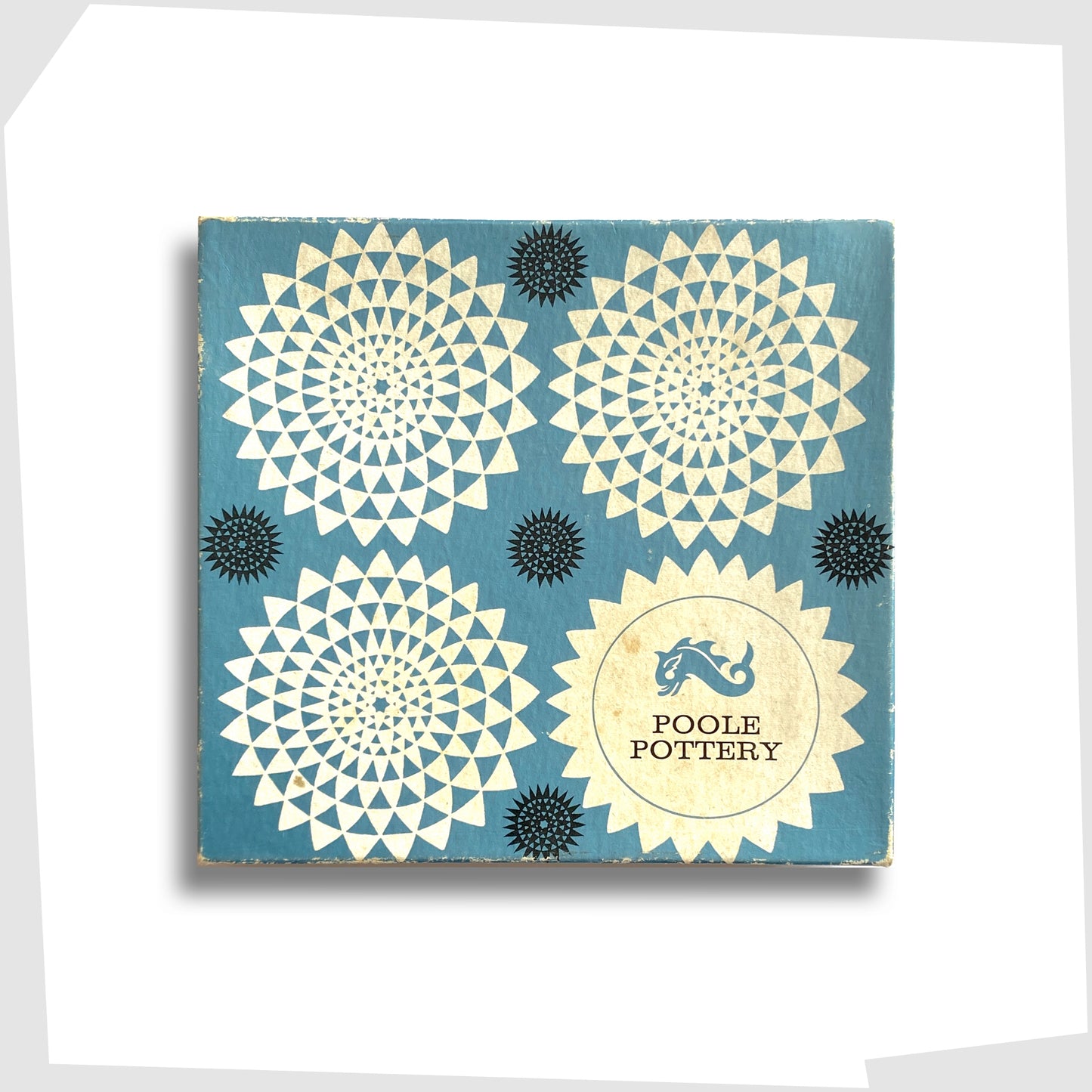 original packaging box of the poole pottery sweet dish in orange delphis glaze