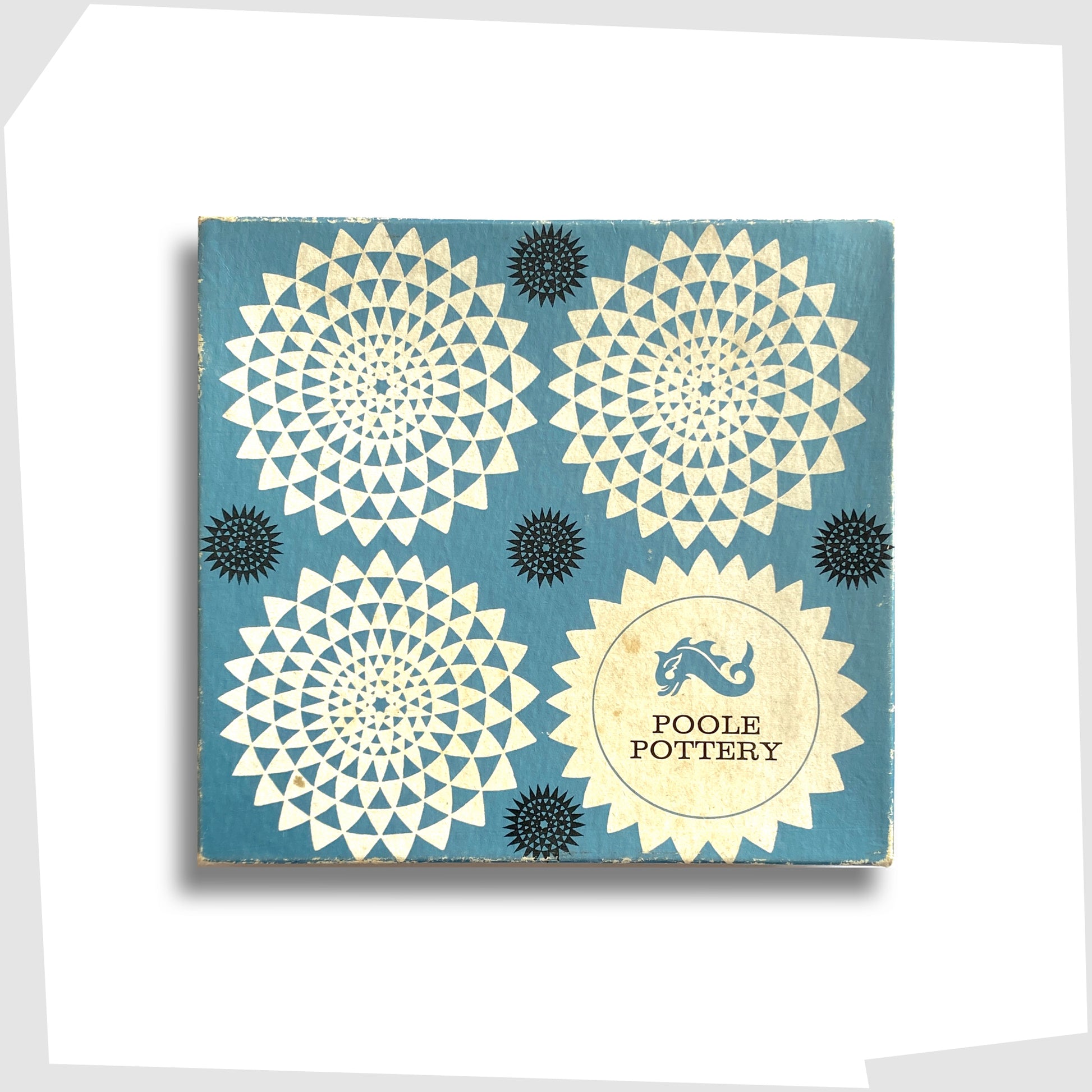 original packaging box of the poole pottery sweet dish in orange delphis glaze