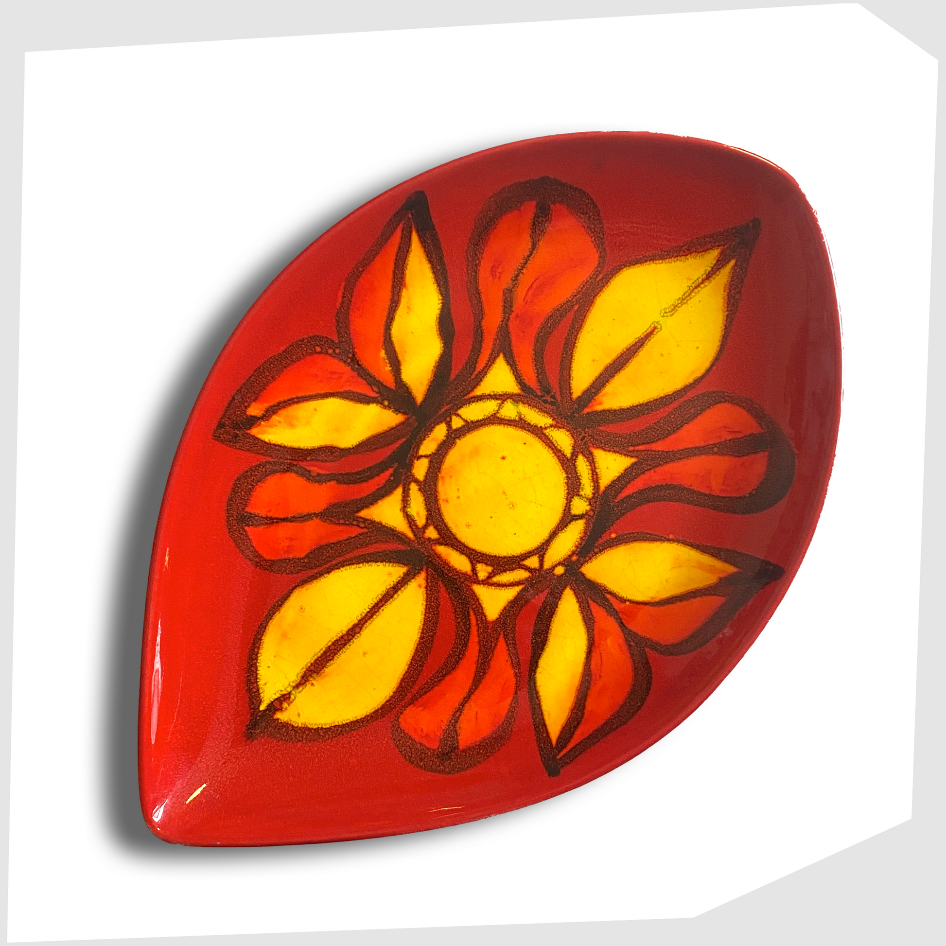 Poole Pottery Delphis Teardrop dish in vivid red and yellow glaze, created by Janet Laird
