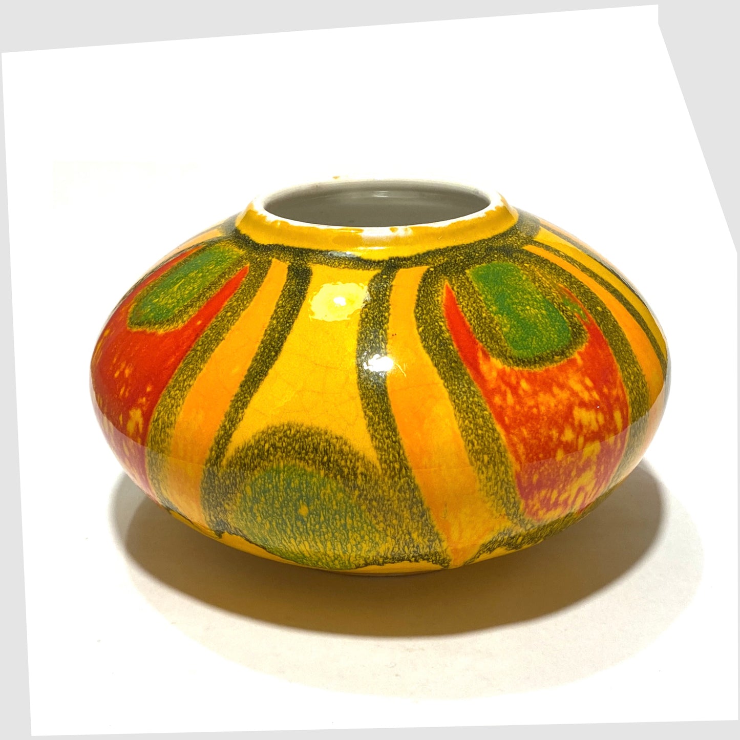top rim of the Poole Pottery Onion Vase, Shape 32, by Gillian Taylor in a vivid yellow glaze with abstract forms of orange, red and green
