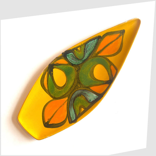 poole pottery delphis spear dish, shape 82, by Rosina St Clayre finished in a vibrant yellow glaze with free-forms of green, orange and turquoise