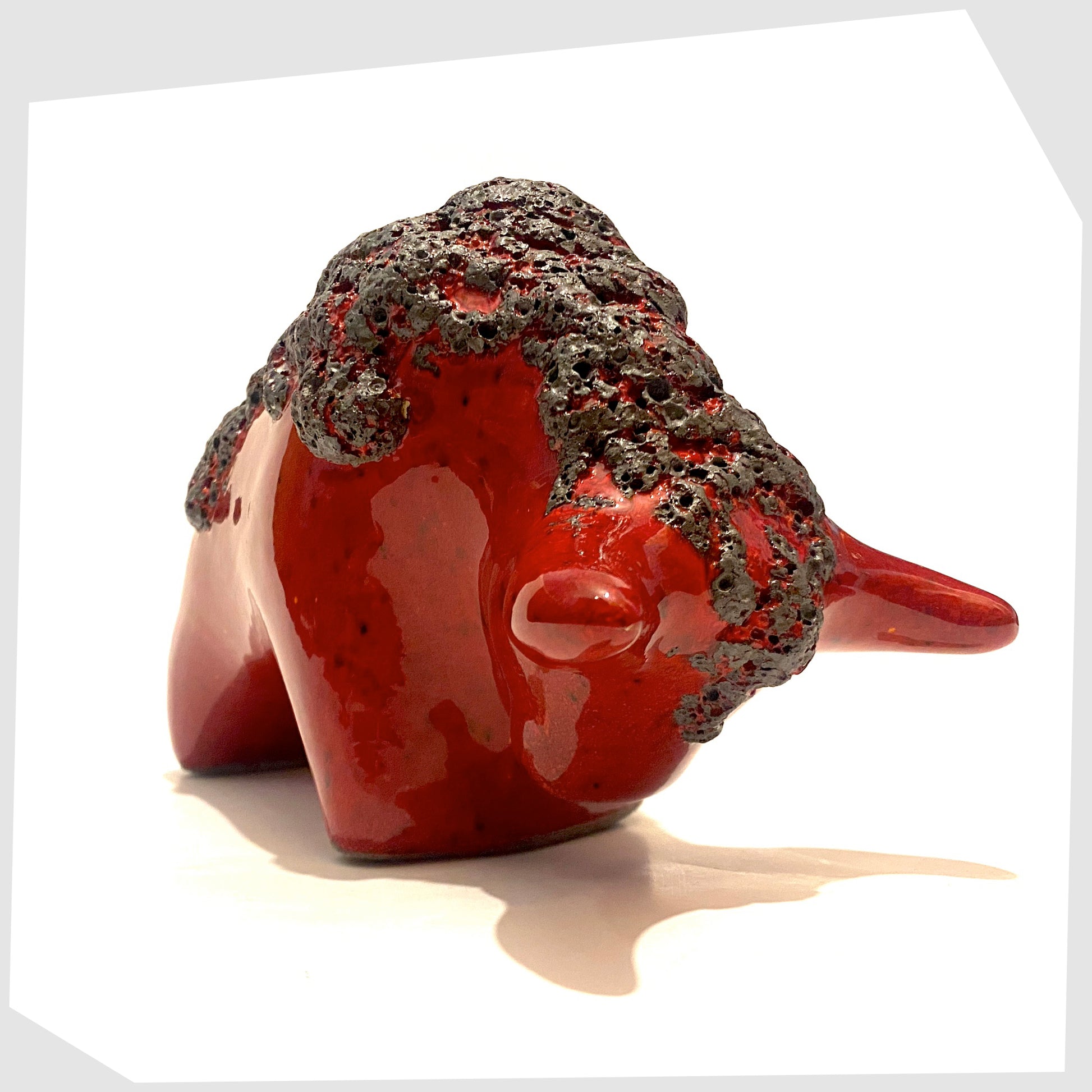 otto-keramik-bull-in-red-with-black-fat-lava-on-back