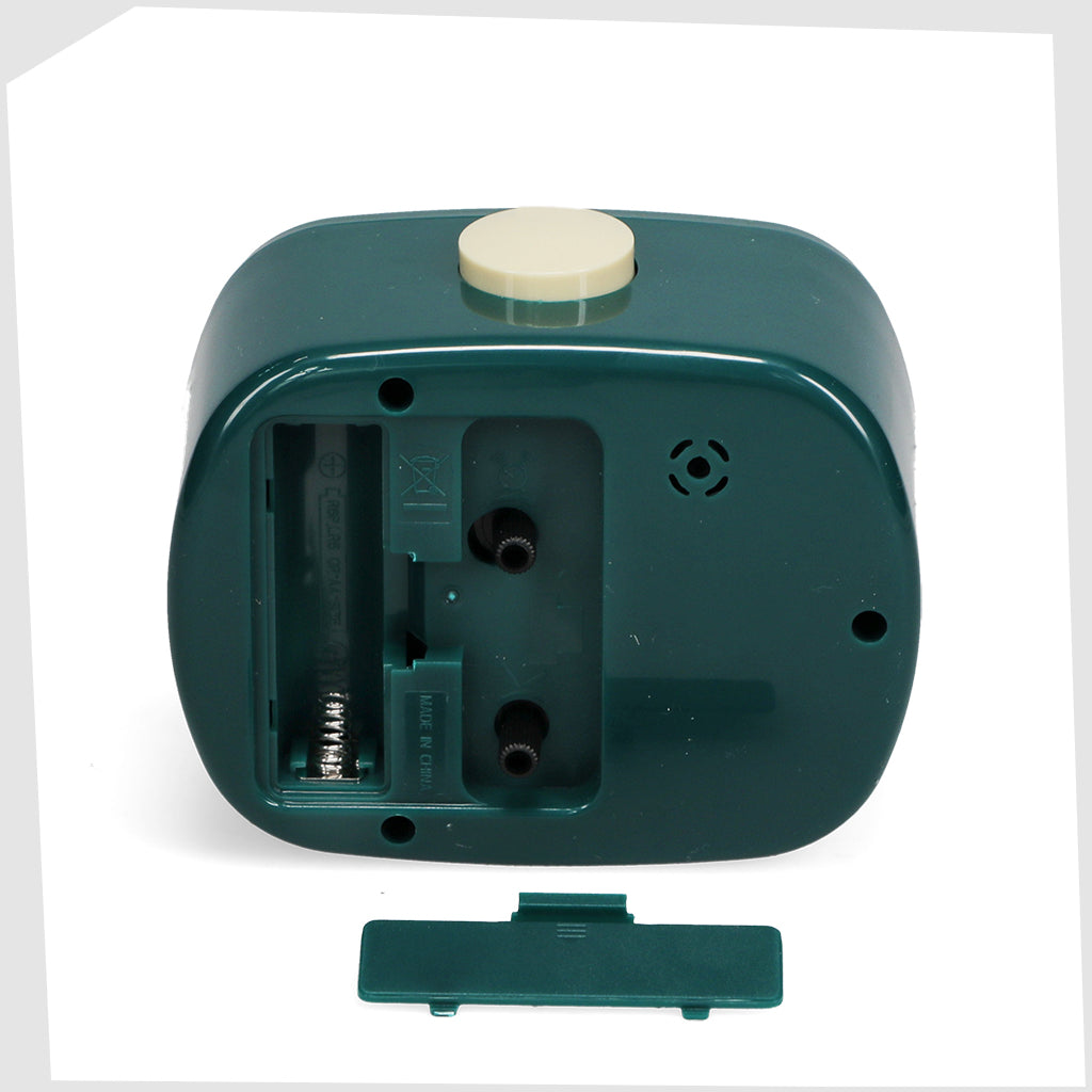 rear of the Petrol Blue Retro Alarm Clock, by Rex London, showing the adjustment knobs and battery compartment