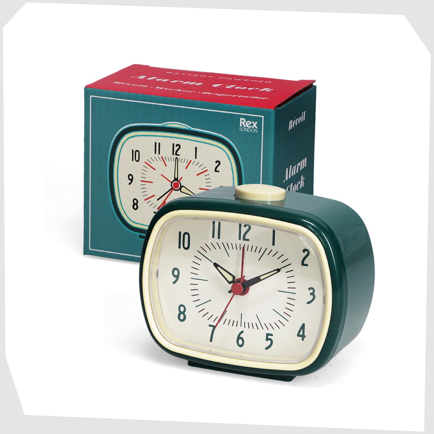Petrol Blue Retro Alarm Clock, by Rex London, showing alongside its retail packaging box