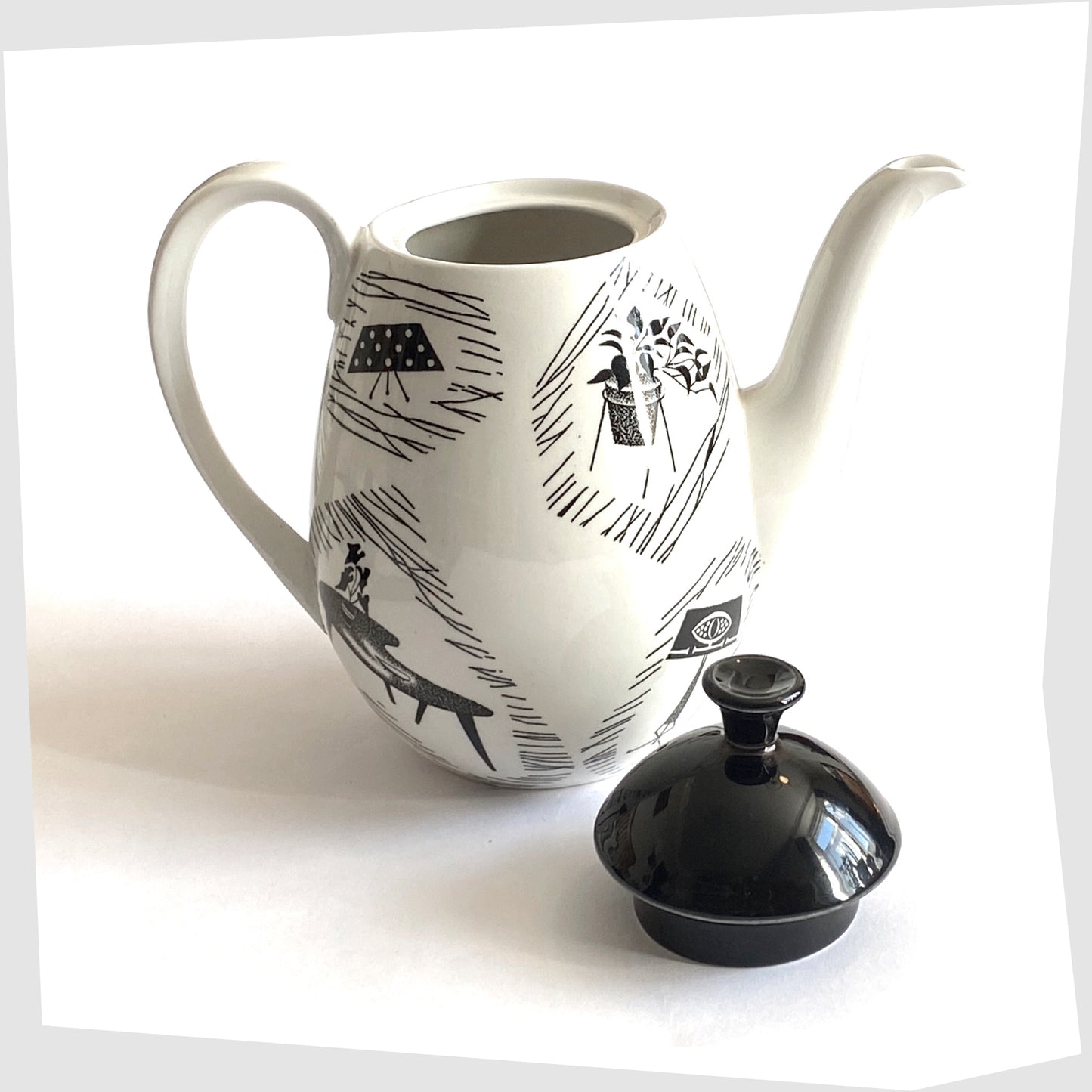 Homemaker Coffee Pot made by Ridway Potteries, Staffordshire. White Coffee Pot glazed with iconic images of mid-century homeware, shown with its black id removed