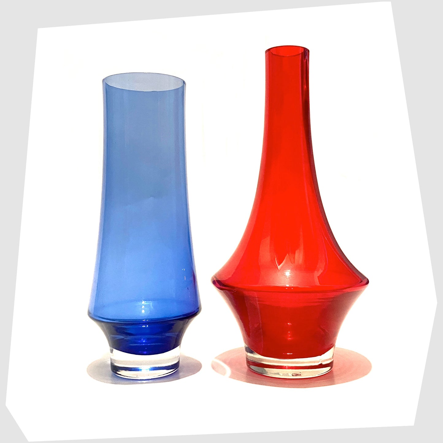 two-finnish-glass-vases-by-riihimaki-one-blue-glass-and-one-red-rocket-vase