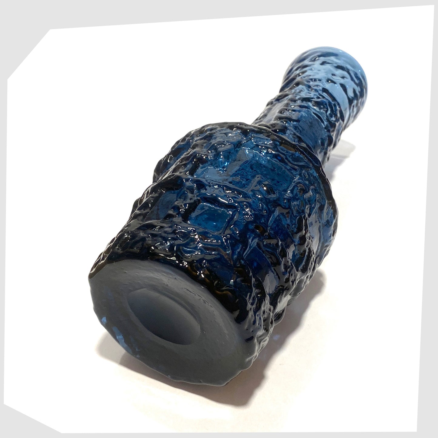Base of the Ruda Glasbruk Vase in a Cobalt Blue glass with  eep bark texture
