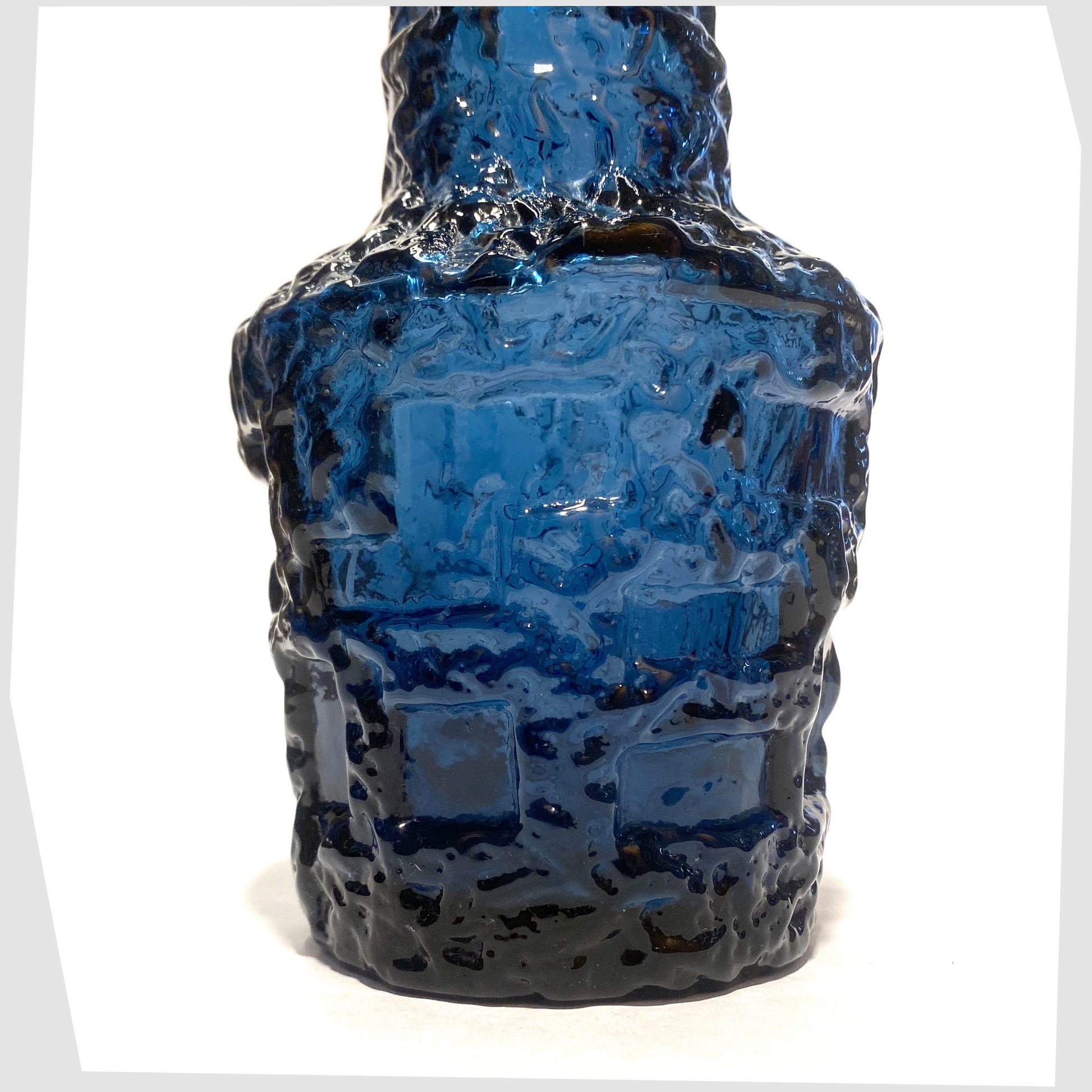 Lower section of the Ruda Glasbruk Vase in a Cobalt Blue glass with  eep bark texture
