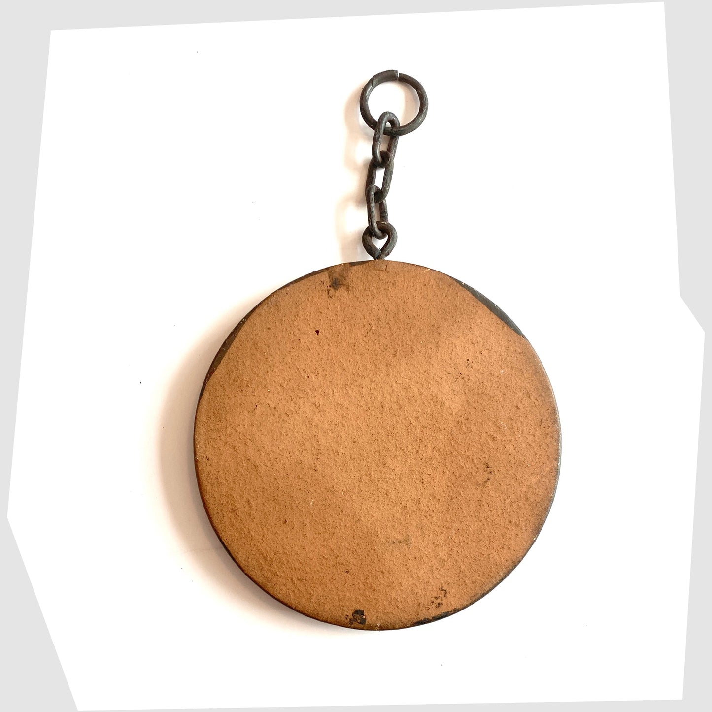 rear of the Ruscha Keramik Wall Plaque made in 1970s West Germany, with original chain mount