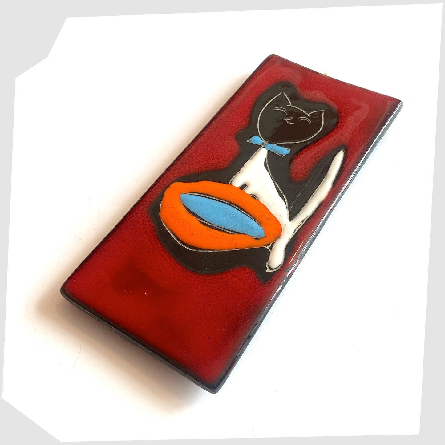 1960s Rectangular San Marino Pottery Wall Plaque featuring a black cat with blue bow tie and orange water bowl on a vibrant red glaze, shown on a white background