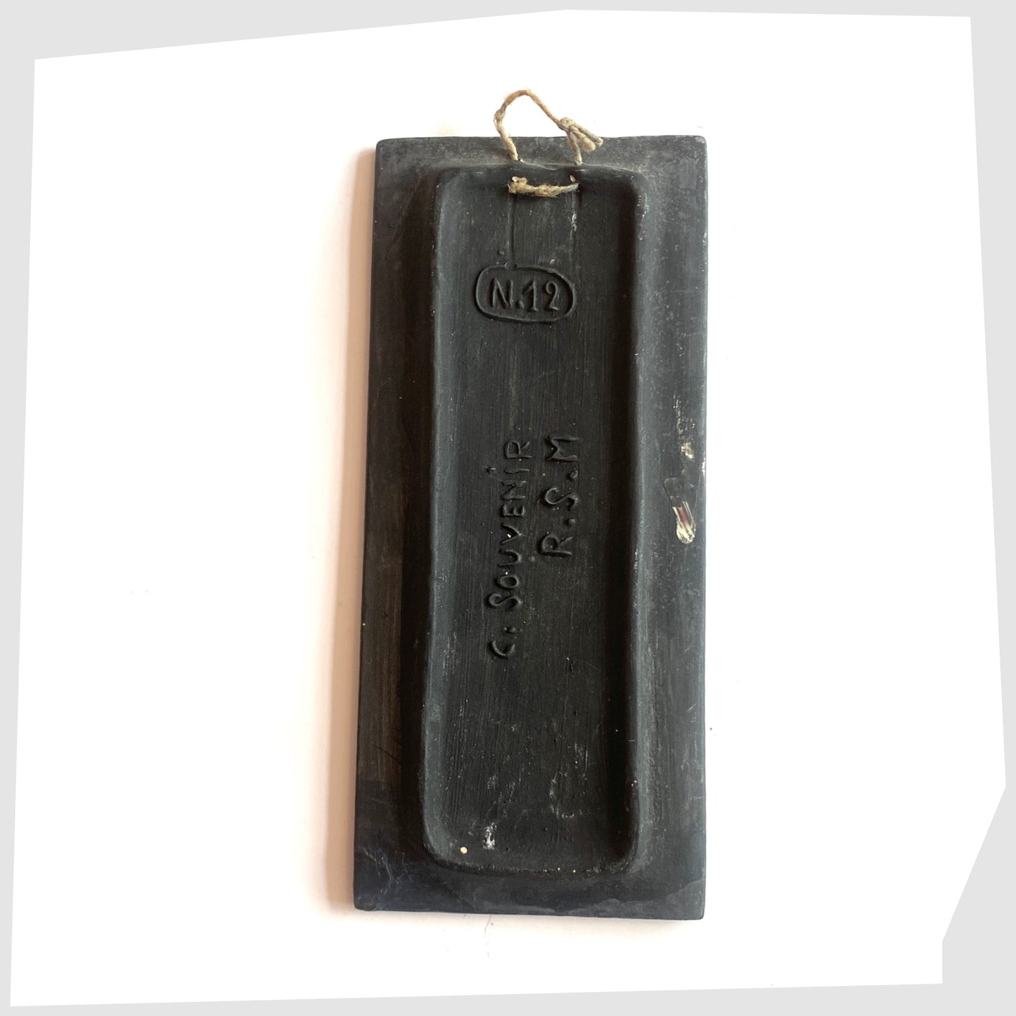 Rear of the rectangular San Marino Pottery Wall Plaque with impressed model number, shown on a white background